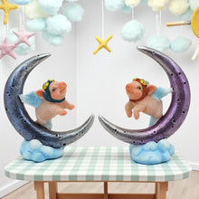 Laden Sie das Bild in den Galerie-Viewer, Whimsical Flying Pigs on Moon Figurine Pair Cute Fantasy Ornaments Home Deco