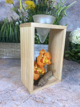 Laden Sie das Bild in den Galerie-Viewer, Elegant Orchid Artificial Flower Arrangement with Wooden Candle Holder - 19 cm Tall-OsirisTradingUK