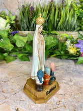 Load image into Gallery viewer, Our Lady of Fatima Resin Statue with Children, Hand-Painted Marian Figurine, Religious Art, Christian Decor, Spiritual Collectible-OsirisTradingUK