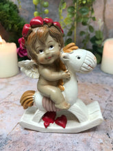 Load image into Gallery viewer, Pair of Guardian Angel Figurine Cherub on Rocking Horse Holding Heart Ornament-Collectables:Fantasy, Myth & Magic:Mythical Creatures:Angels-OsirisTradingUK