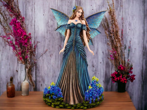Royal Azure Enchantment - Elegant Resin Fairy Statue with Iridescent Wings, Majestic Garden Fairy Collectible, Enchanted Forest Decor