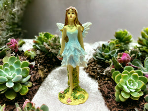 Delicate Flower Fairy Figurine in Resin, Small 10 cm Fairy Statue with Floral Accents for Garden or Home Décor-OsirisTradingUK