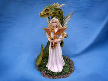 Load image into Gallery viewer, Guardian of the Grimoire Dragon and Fairy Figurine | Protector of the Mystical Tome | Handcrafted Resin Fantasy Collectible
