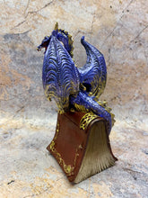 Load image into Gallery viewer, Mystic Sapphire Guardian Dragon on Enchanted Tome - Hand-Painted Resin Dragon Figurine, 16cm Fantasy Home Decor

