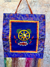 Load image into Gallery viewer, Tibetan Dharma Wheel Wall Banner, Authentic Brocade Silk &amp; Cotton Hanging, Spiritual Meditation Decor, Dharmachakra Symbol, 27x41cm-OsirisTradingUK
