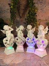 Load image into Gallery viewer, Set of Four Guardian Angel Figurine LED Cherubs Resting on Heart Sculpture Gift
