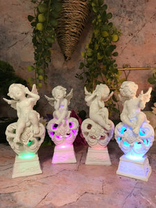 Set of Four Guardian Angel Figurine LED Cherubs Resting on Heart Sculpture Gift